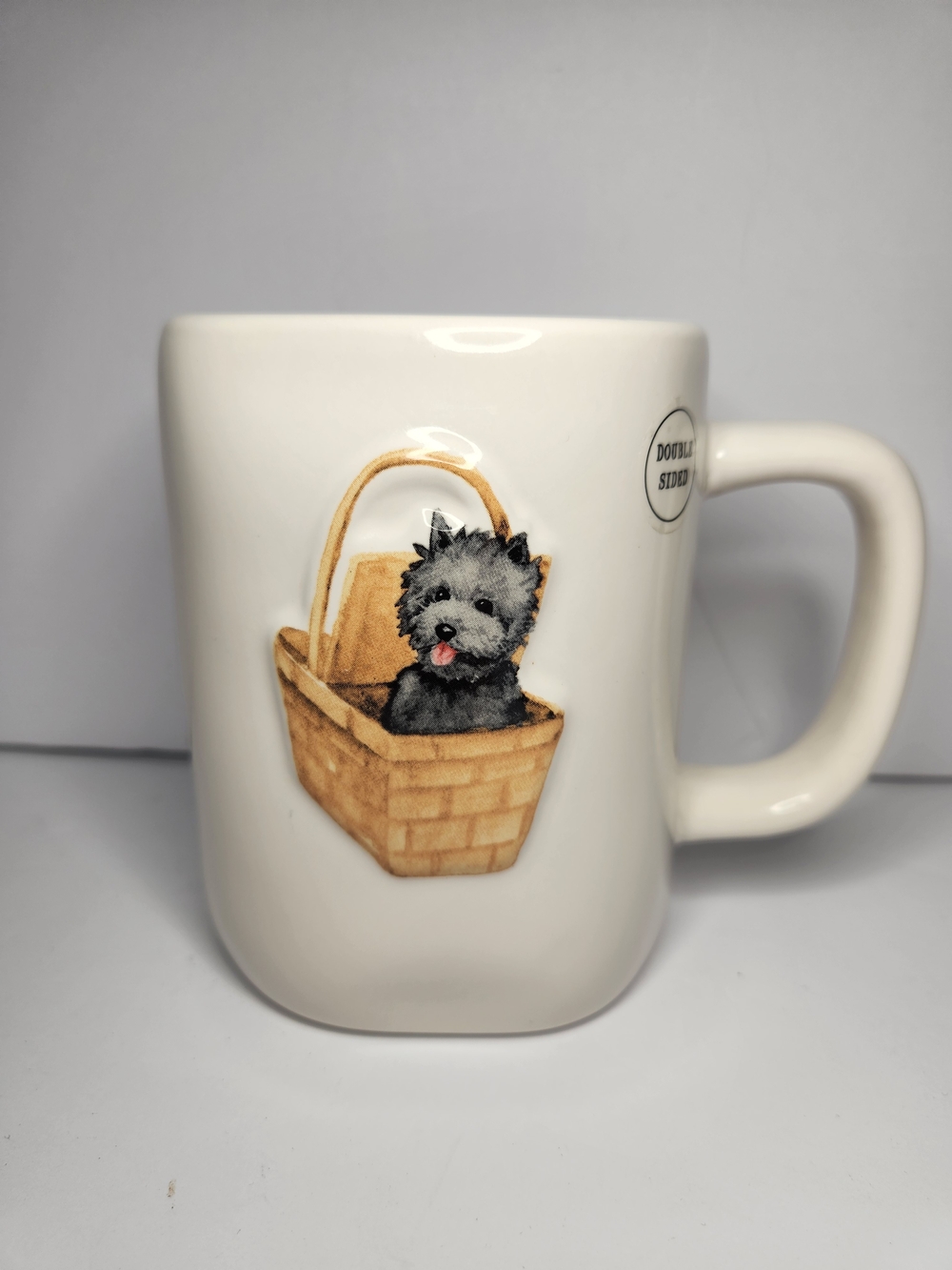 Rae Dunn White Ceramic Mug with Black Puppy in Tan Basket